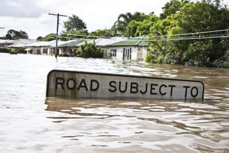 Flooded "Road subjet to Flooding" sign