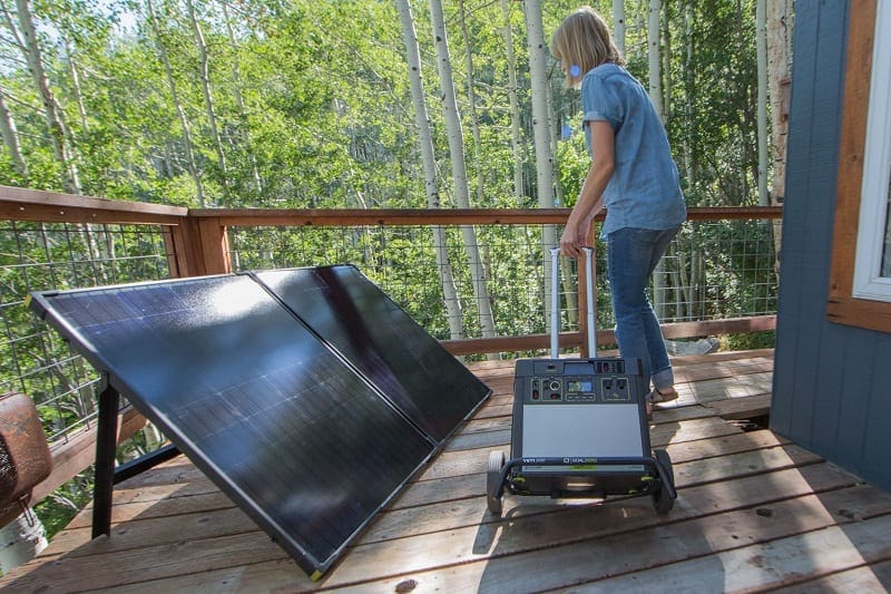 2 Boulder solar panels and a Yeti 3000 being wheeled into place.